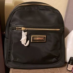 Calvin Klein, women’s Nylon backpack, color black with gold.